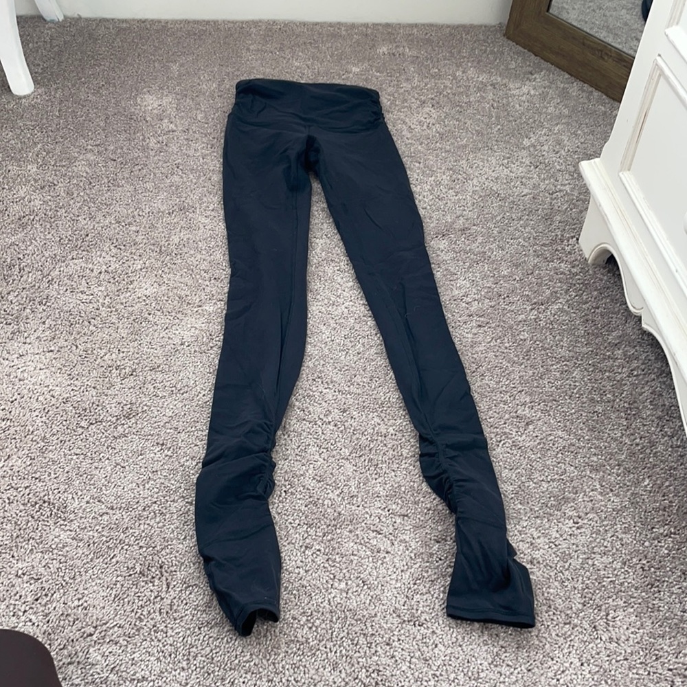 Lululemon ruched side black leggings with footie covers, size 2